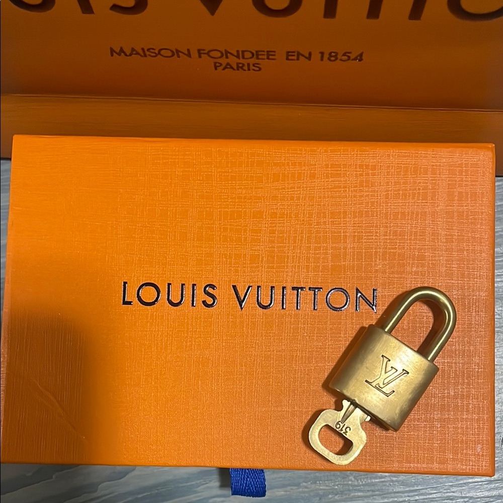 Louis Vuitton Gold Padlock with Key